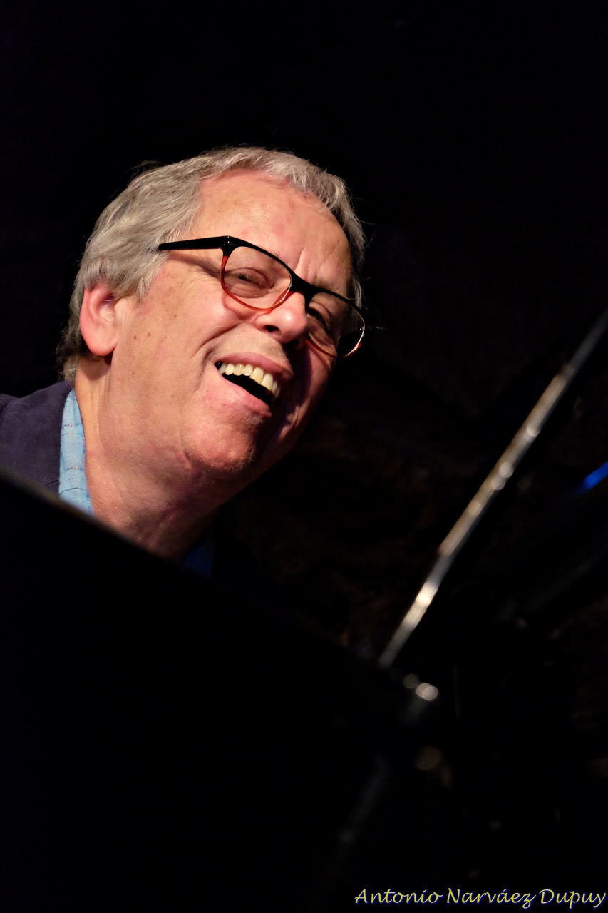 Kenny Werner, smiling at piano